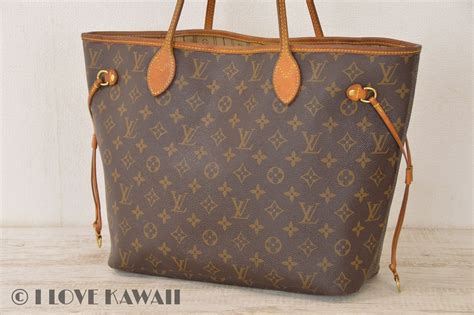 m40156 louis vuitton|Louis Vuitton reversible tote.